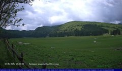 view from Webcam Cansiglio - verso la piana dei "Bech" on 2025-05-10