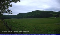 view from Webcam Cansiglio - verso la piana dei "Bech" on 2025-05-27