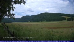 view from Webcam Cansiglio - verso la piana dei "Bech" on 2025-07-11