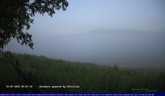 view from Webcam Cansiglio - verso la piana dei "Bech" on 2025-07-15