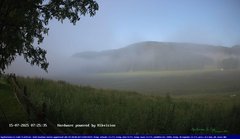 view from Webcam Cansiglio - verso la piana dei "Bech" on 2025-07-15