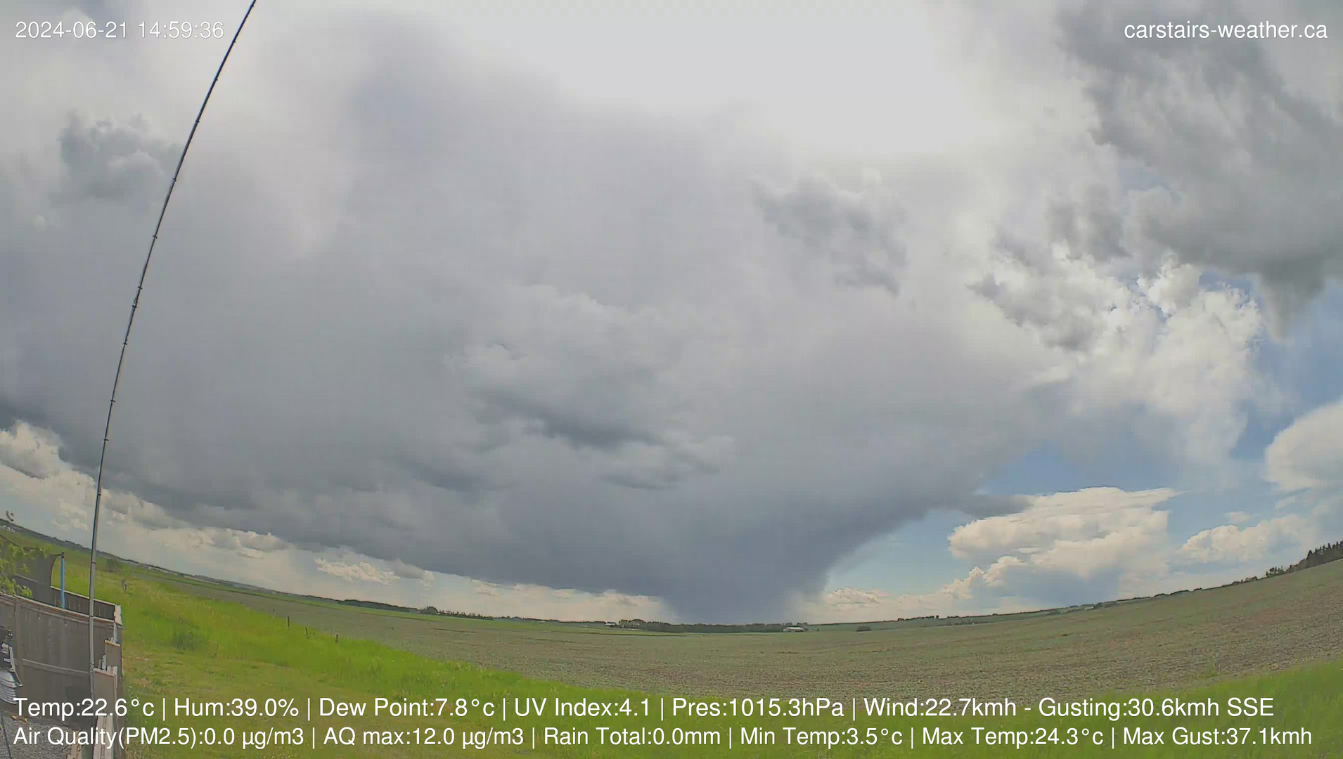 time-lapse frame, June 21 Storm cell tracking East towards Airdire webcam