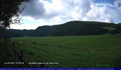 view from Webcam Cansiglio - verso la piana dei "Bech" on 2023-09-16