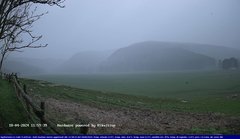 view from Webcam Cansiglio - verso la piana dei "Bech" on 2024-04-18