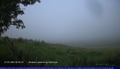 view from Webcam Cansiglio - verso la piana dei "Bech" on 2024-07-27