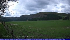 view from Webcam Cansiglio - verso la piana dei "Bech" on 2025-04-27